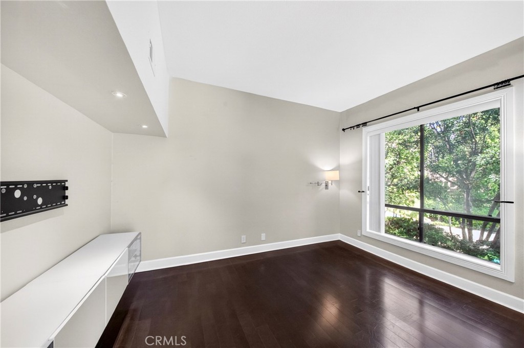 9 Madrona Irvine, CA 92612 - Photo 15 of 38 a big room with wooden floor and windows