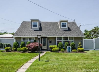 2 Fairfield Road Massapequa, NY 11758 - Photo 1 of 13 a view of a house with a garden and plants