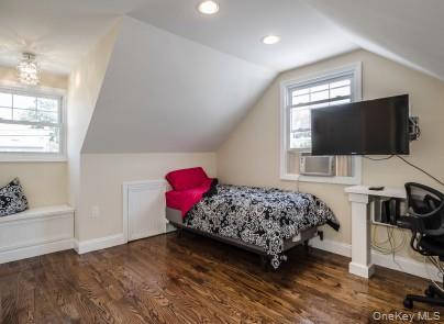 2 Fairfield Road Massapequa, NY 11758 - Photo 10 of 13 a bedroom with bed and flat screen tv