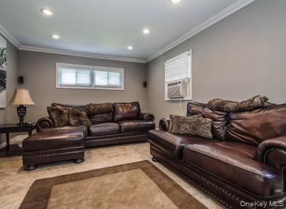 2 Fairfield Road Massapequa, NY 11758 - Photo 6 of 13 a living room with furniture window and a couch