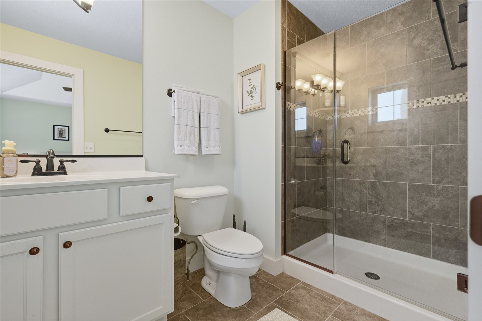 1661 Belclare Road Normal, IL 61761 - Photo 11 of 22 a bathroom with a sink a toilet and shower