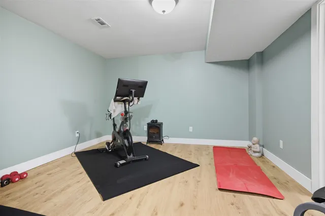 a white toilet sitting next to a bathroom sink