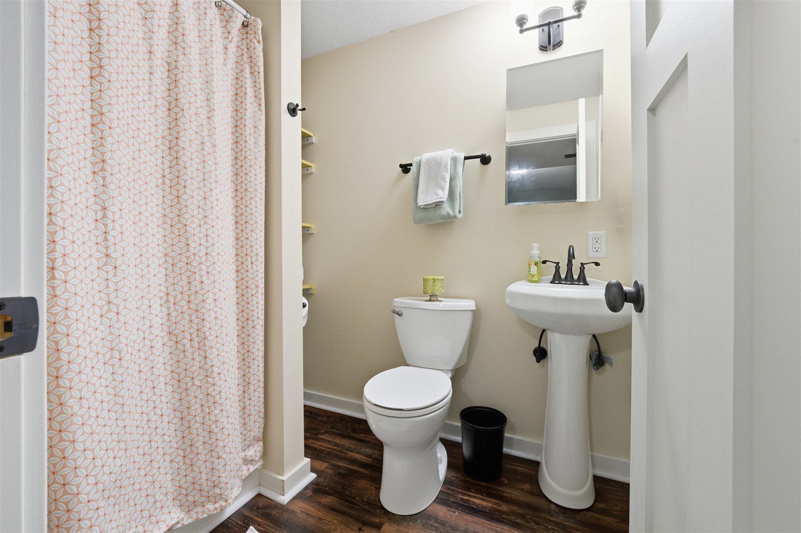 1661 Belclare Road Normal, IL 61761 - Photo 18 of 22 a white toilet sitting next to a bathroom sink