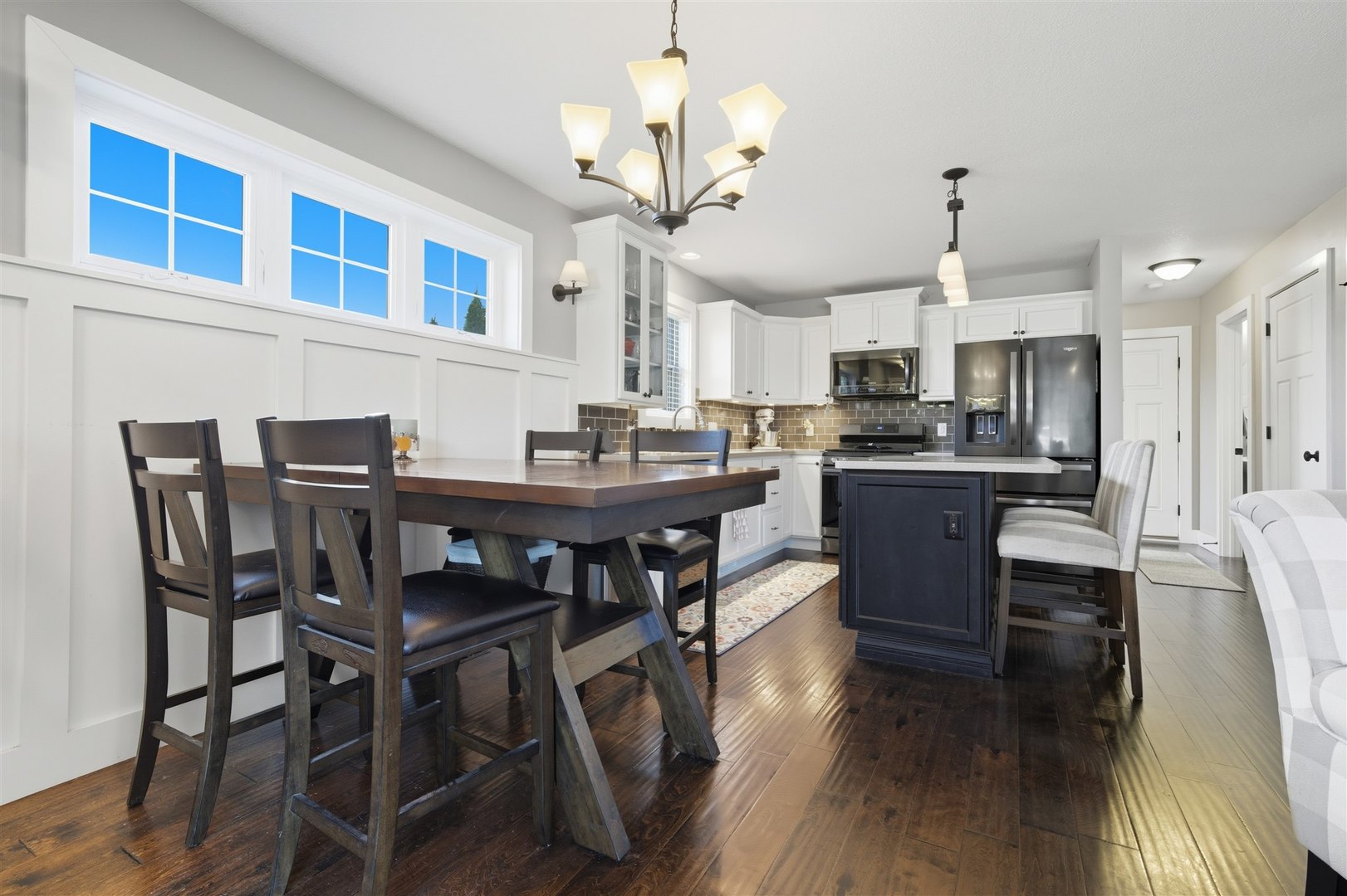 1661 Belclare Road Normal, IL 61761 - Photo 6 of 22 a view of a dining room with furniture wooden floor and chandelier