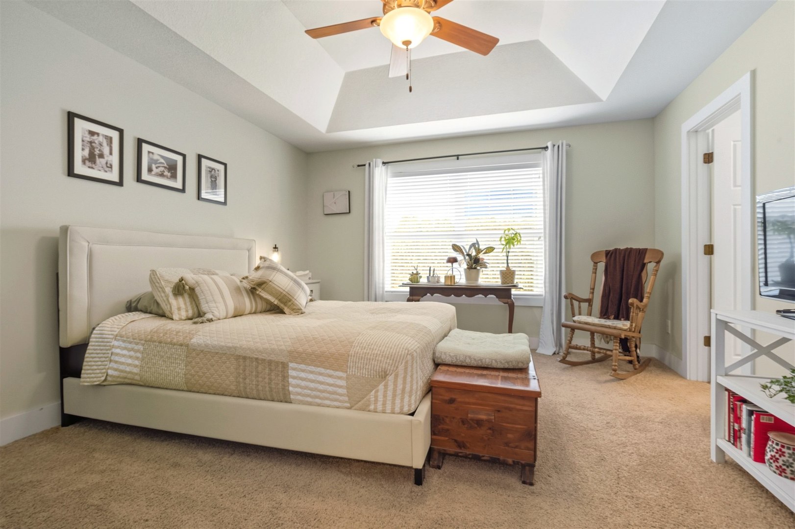 1661 Belclare Road Normal, IL 61761 - Photo 10 of 22 a bedroom with a bed a couch and a chandelier