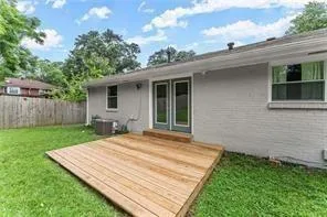 a view of a backyard with a garden and plants