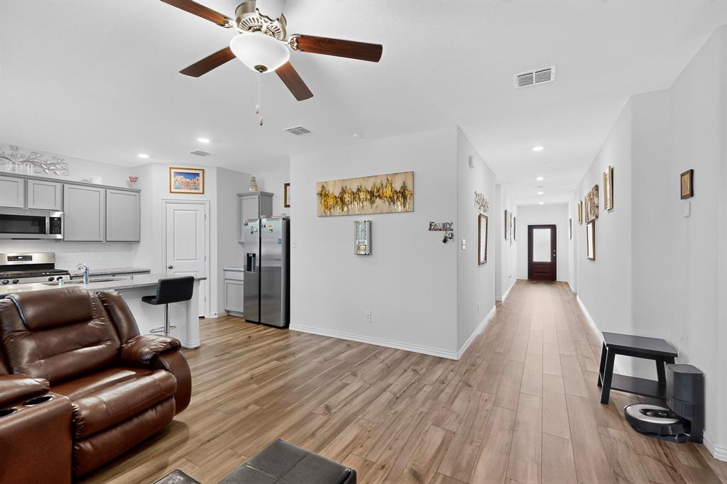 444 Ranchito Pass Fort Worth, TX 76052 - Photo 4 of 18 a living room with furniture and a wooden floor