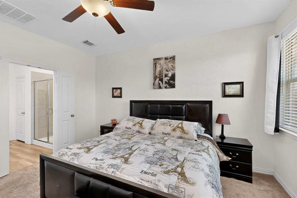 444 Ranchito Pass Fort Worth, TX 76052 - Photo 8 of 18 a bedroom with a bed and a dresser