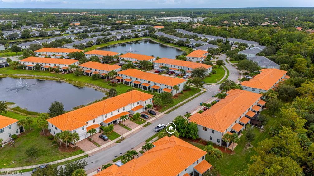 15326 Summit Pl Circle Naples, FL 34119 - Photo 16 of 21 an aerial view of residential houses with outdoor space