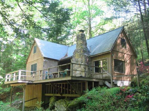 19 Warren Hill Road Cornwall, CT 06754 - Photo 1 of 1 a view of a house with a roof deck