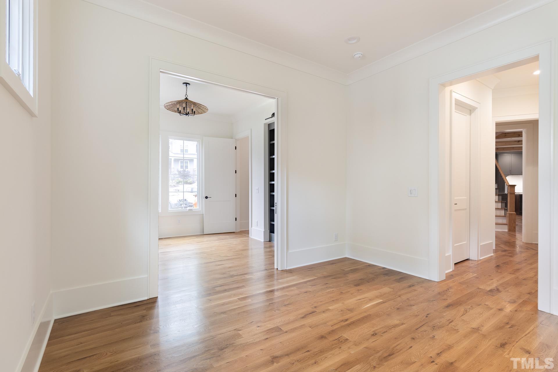 6316 Stephens Rdg Court Raleigh, NC 27615 - Photo 26 of 53 a view of a hallway with wooden floor