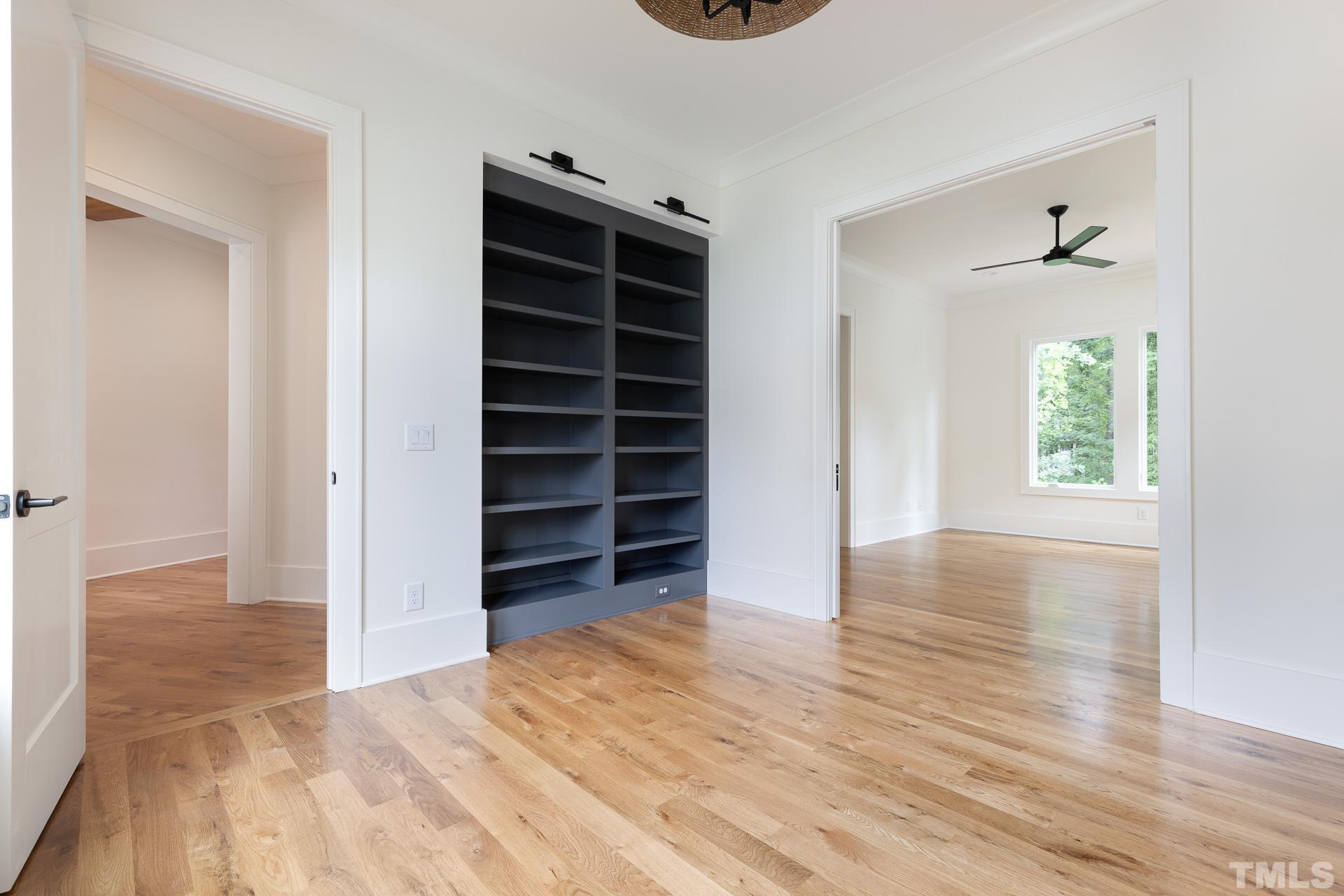 6316 Stephens Rdg Court Raleigh, NC 27615 - Photo 27 of 53 wooden floor in an empty room with a window