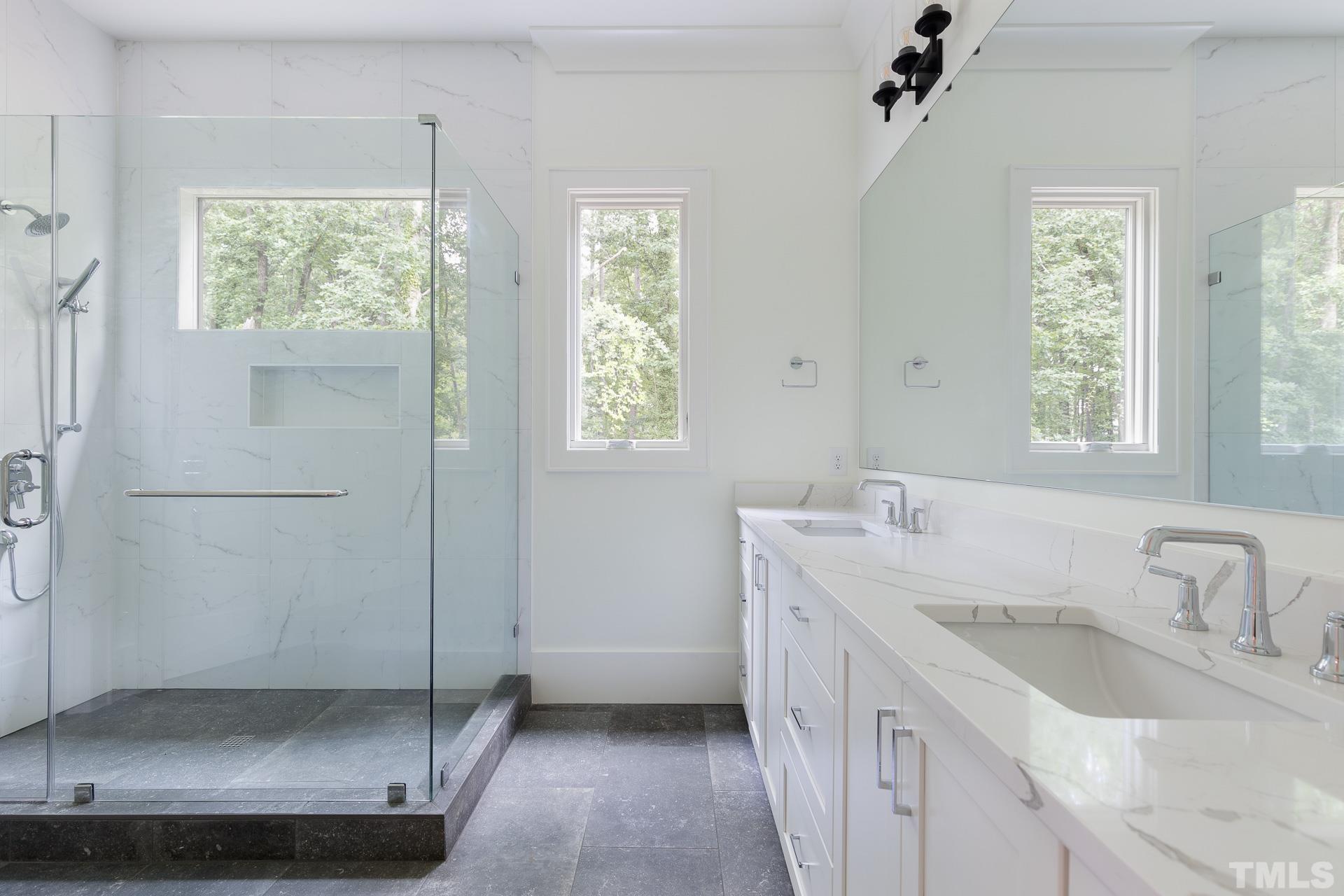 6316 Stephens Rdg Court Raleigh, NC 27615 - Photo 30 of 53 a bathroom with a sink a toilet and a window