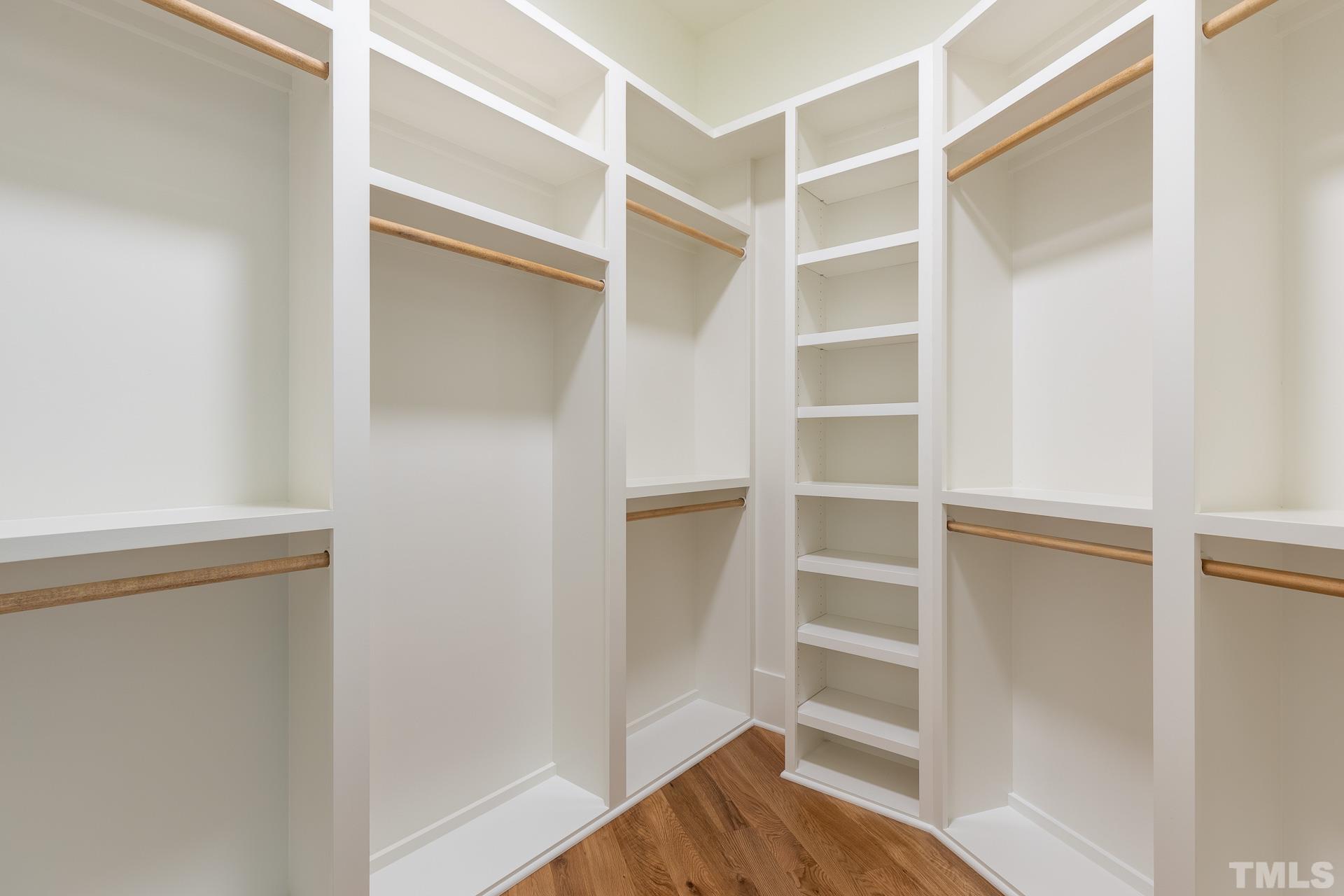 6316 Stephens Rdg Court Raleigh, NC 27615 - Photo 31 of 53 a view of walk in closet with empty racks