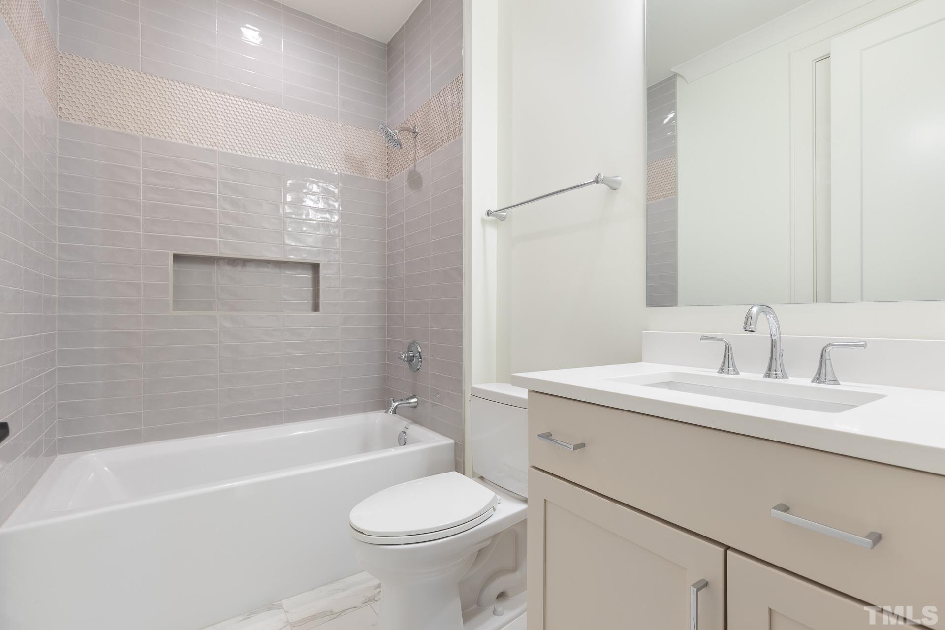 6316 Stephens Rdg Court Raleigh, NC 27615 - Photo 43 of 53 a bathroom with a sink a toilet and a bathtub