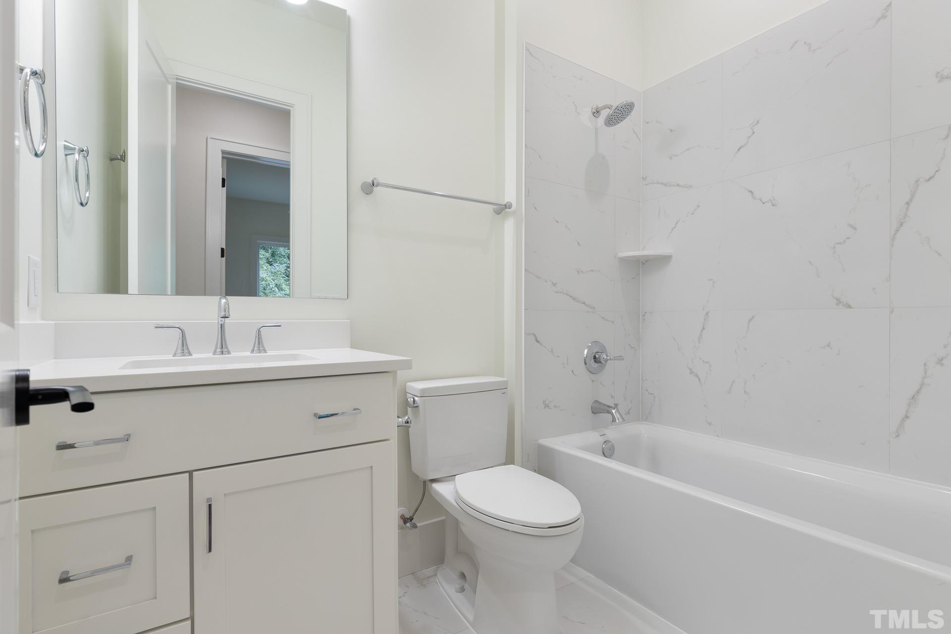 6316 Stephens Rdg Court Raleigh, NC 27615 - Photo 49 of 53 a bathroom with a sink a toilet and shower