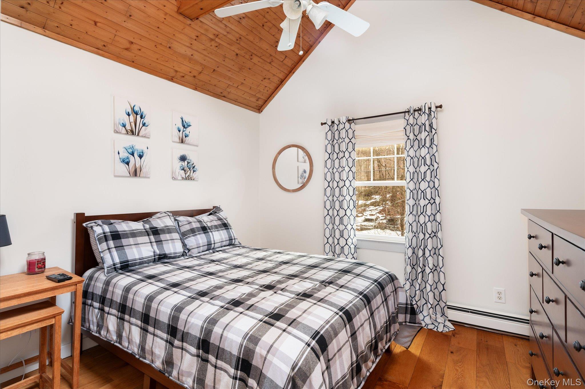 84 Hemlock Road South Salem, NY 10590 - Photo 16 of 25 a bedroom with a bed and wooden floor