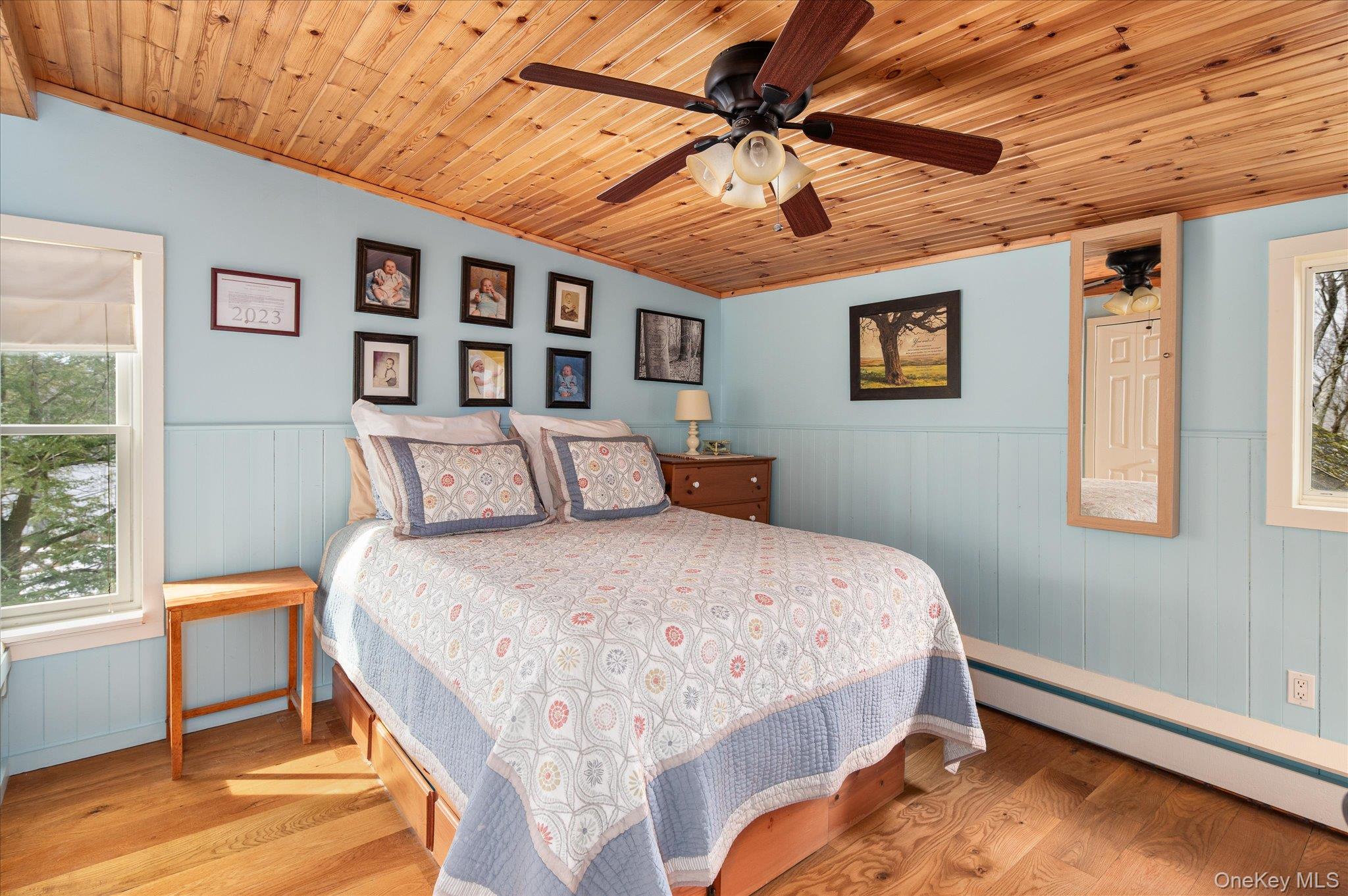 84 Hemlock Road South Salem, NY 10590 - Photo 17 of 25 a bedroom with a bed and a chandelier