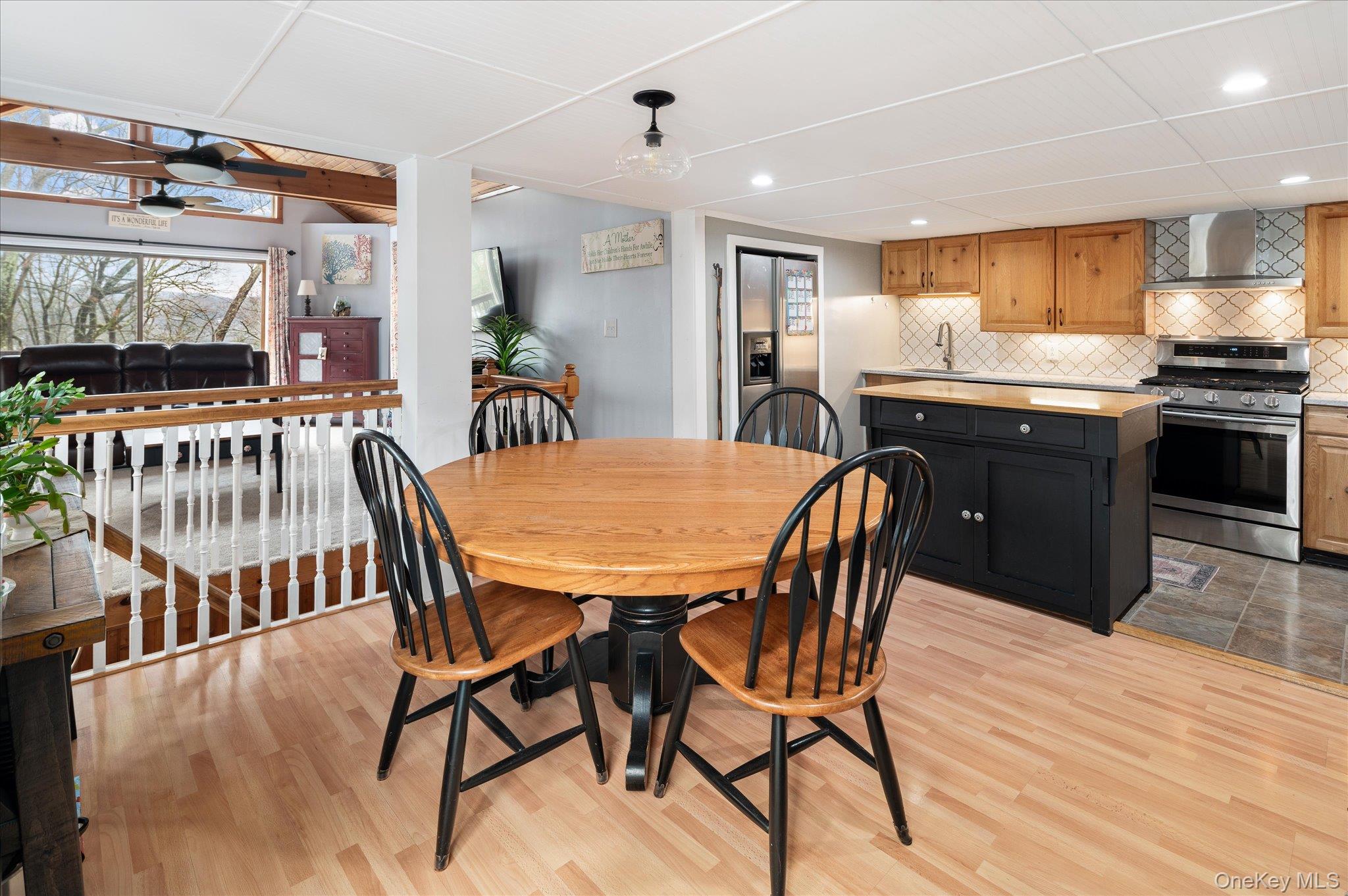 84 Hemlock Road South Salem, NY 10590 - Photo 5 of 25 a view of a dining room with furniture and wooden floor
