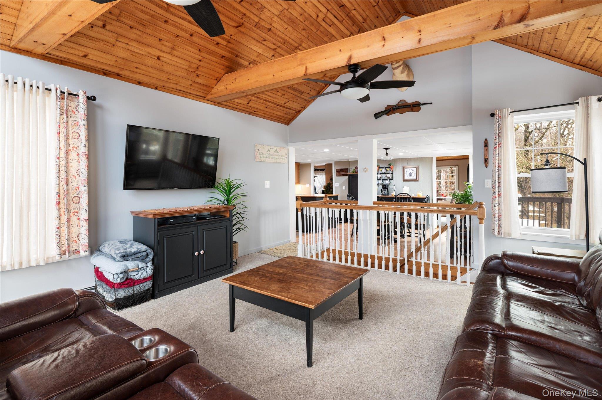 84 Hemlock Road South Salem, NY 10590 - Photo 10 of 25 a living room with furniture a flat screen tv and a window