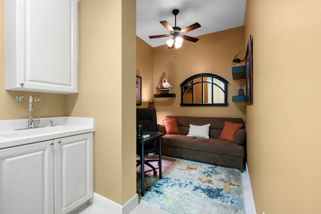 a living room with furniture and a window