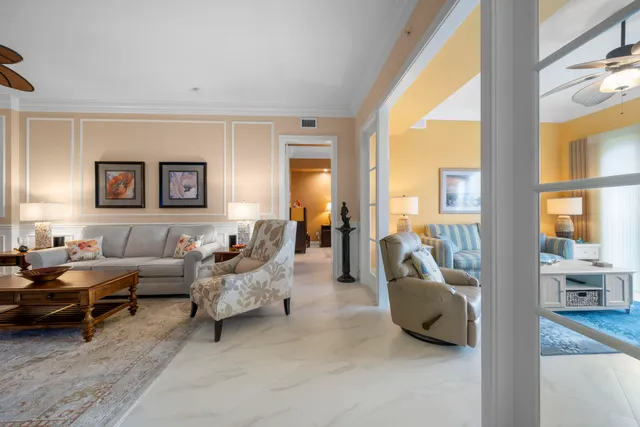 a balcony with a table and chairs