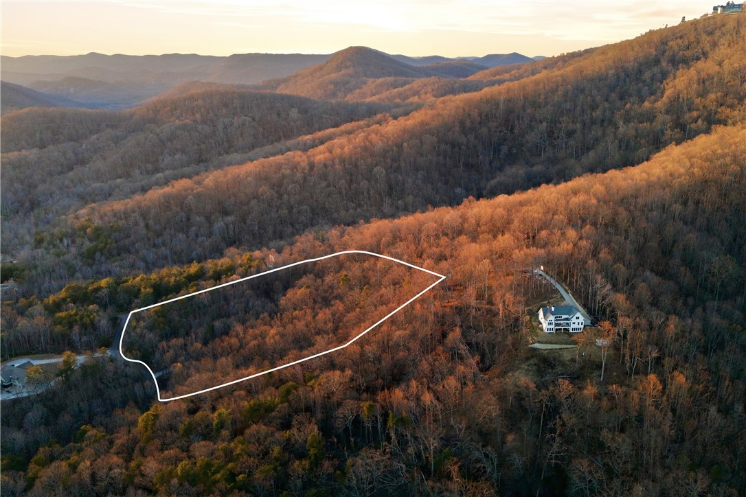 Lot 13 Hideaway Hill Way Landrum, SC 29356 - Photo 1 of 17 This sweeping aerial view showcases a picturesque mountain landscape, ideal for a private estate.