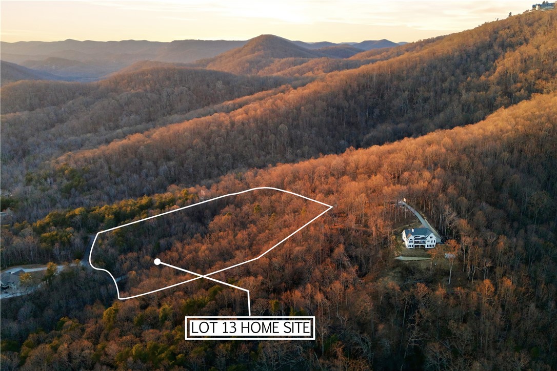 Lot 13 Hideaway Hill Way Landrum, SC 29356 - Photo 14 of 17 This lot offers an exceptional building opportunity with mountain views and a tranquil natural setting.