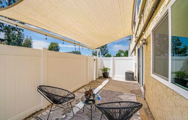 a backyard of a house with seating space