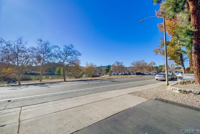 a view of a street with a building in the background