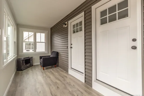 a view of livingroom with furniture and windows