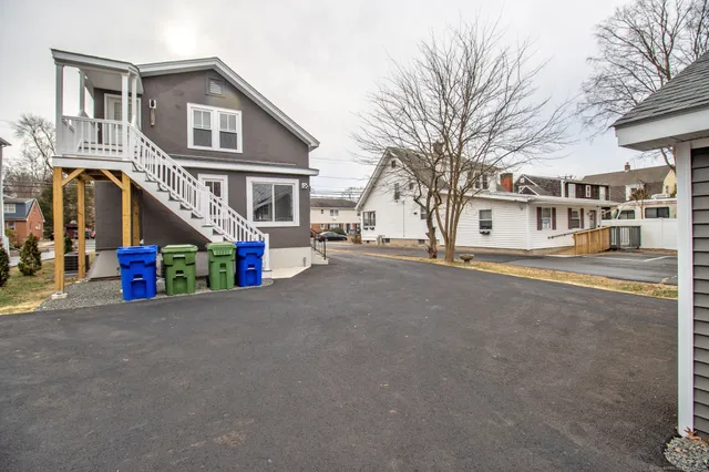 a view of a house with a street