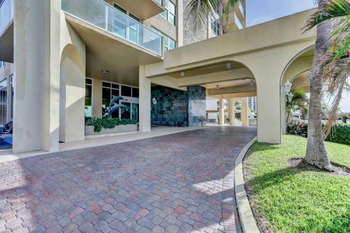 5440 North Ocean Drive, Unit 1502 Singer Island, FL 33404 - Photo 31 of 34 a view of a building with a yard