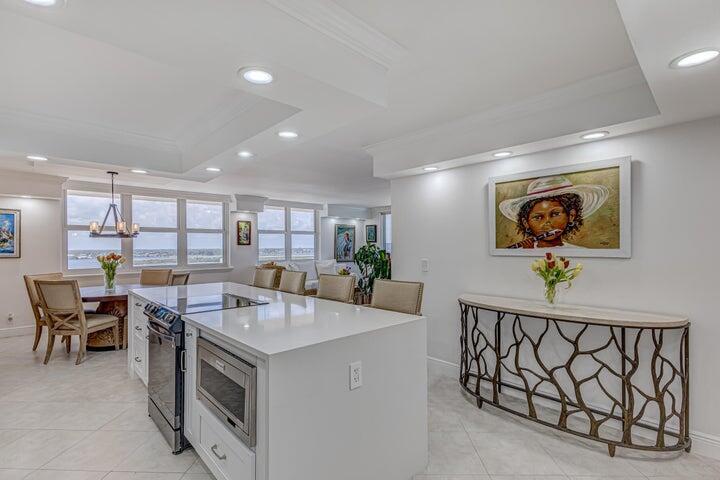 5440 North Ocean Drive, Unit 1502 Singer Island, FL 33404 - Photo 7 of 34 a view of a livingroom with furniture and window