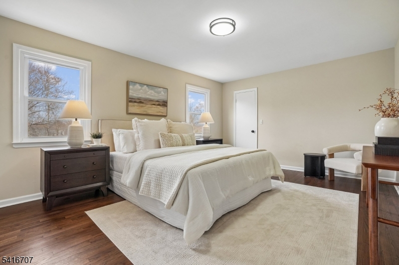 18 Juniper Way Bernards, NJ 07920 - Photo 17 of 31 a bedroom with a large bed and a window