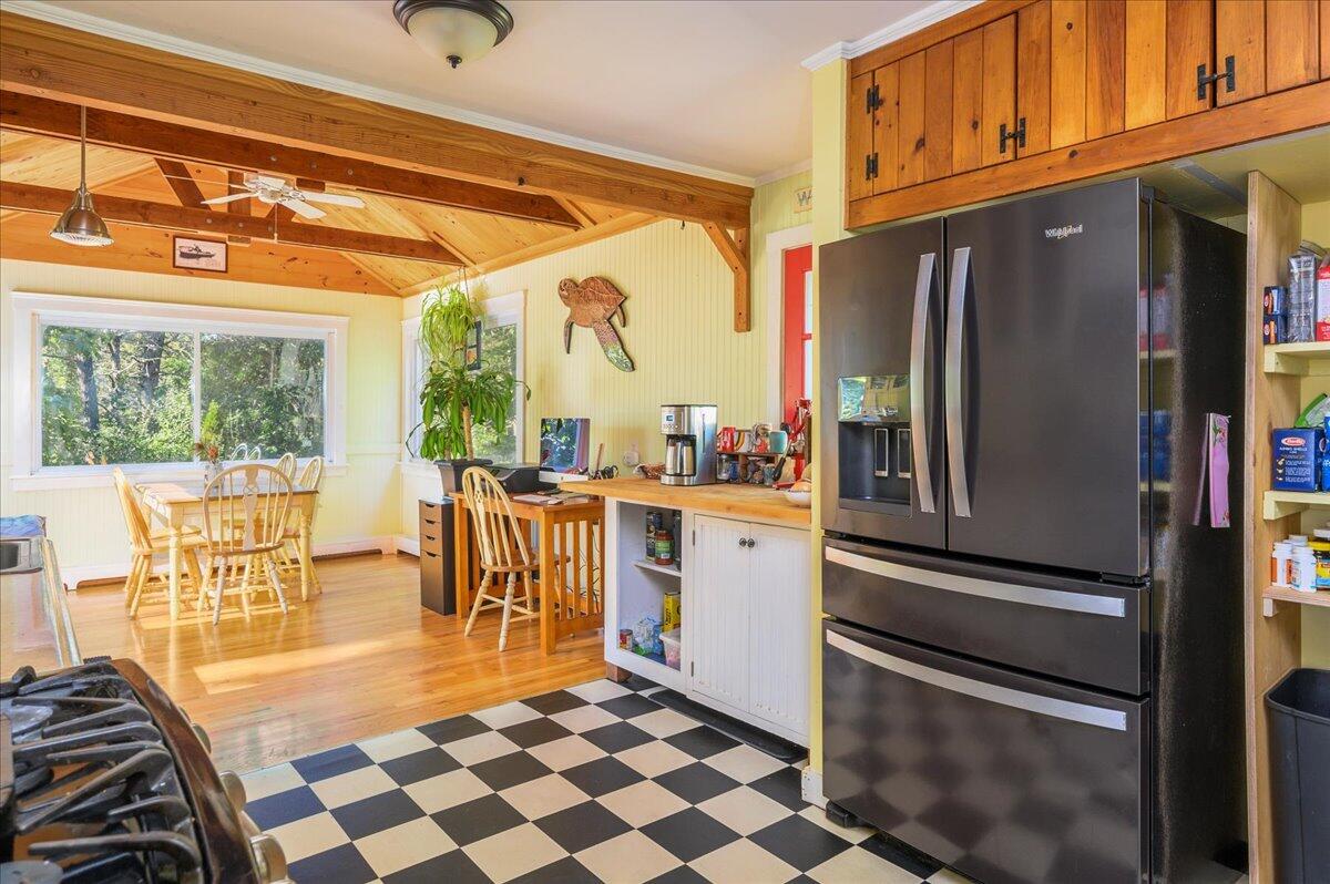 25 Cranberry Hollow Road Wellfleet, MA 02667 - Photo 2 of 18 a kitchen with stainless steel appliances granite countertop a refrigerator and a stove top oven