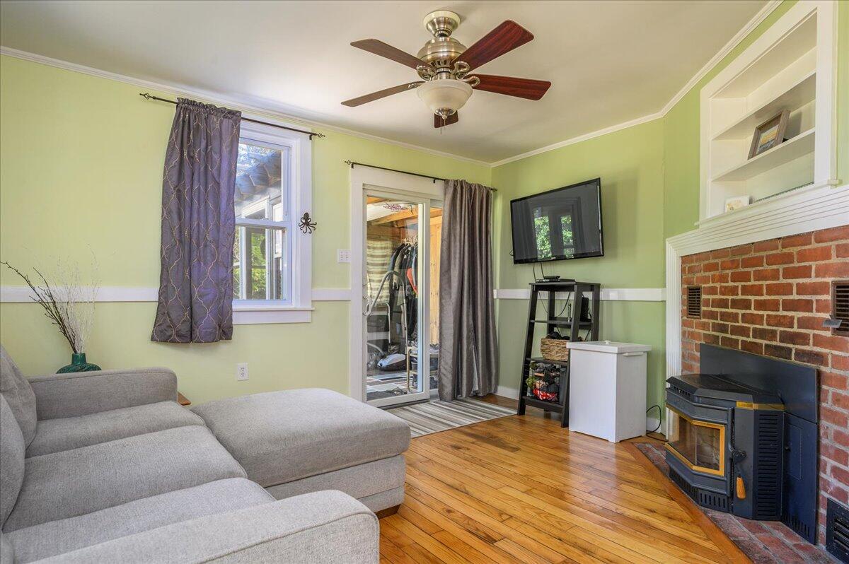 25 Cranberry Hollow Road Wellfleet, MA 02667 - Photo 6 of 18 a living room with furniture and a flat screen tv