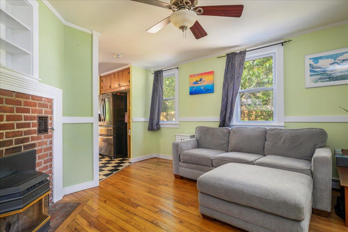 25 Cranberry Hollow Road Wellfleet, MA 02667 - Photo 7 of 18 a living room with furniture and a flat screen tv