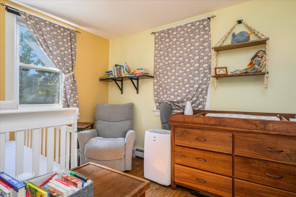25 Cranberry Hollow Road Wellfleet, MA 02667 - Photo 8 of 18 a living room with furniture and wooden floor