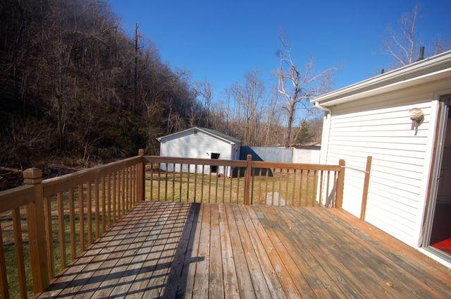 503 Brake Road Elliston, VA 24087 - Photo 14 of 21 a view of balcony with wooden floor and fence