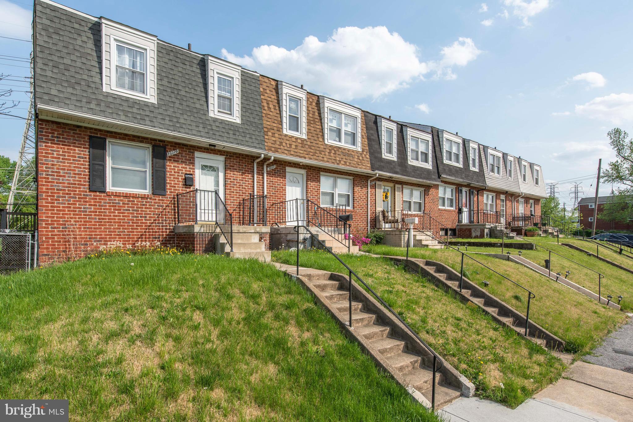 5607 Whitby Road Baltimore, MD 21206 - Photo 1 of 20 a brick building with a yard in front of it