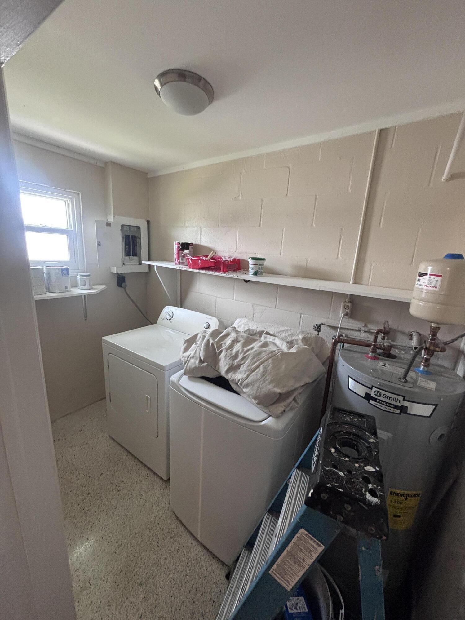 202 Balboa Street, Unit A Fort Pierce, FL 34949 - Photo 10 of 10 a bed room with a bed and a couch