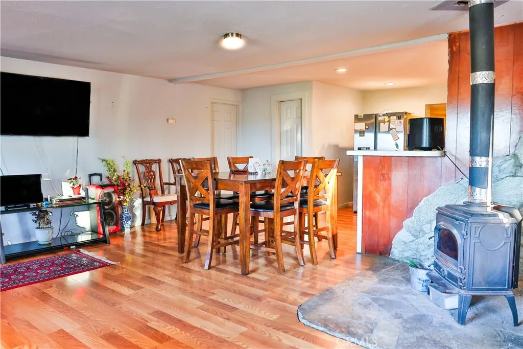 10825 Paskenta Road Red Bluff, CA 96080 - Photo 30 of 42 a living room with stainless steel appliances furniture and a flat screen tv