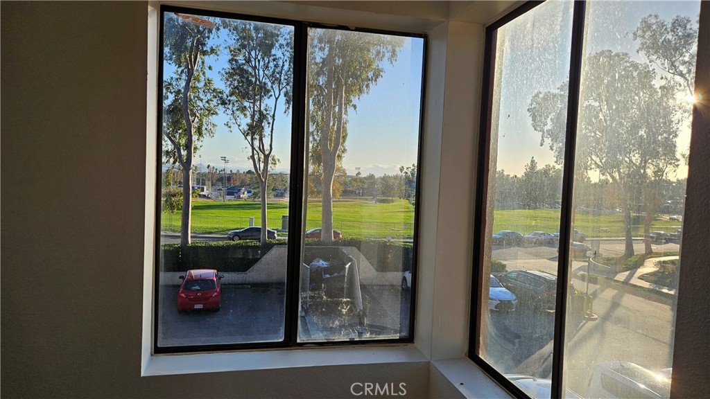 1400 West Edgehill Road, Unit 24 San Bernardino, CA 92405 - Photo 4 of 6 a view of a floor to ceiling window next to an empty room and floor to ceiling window