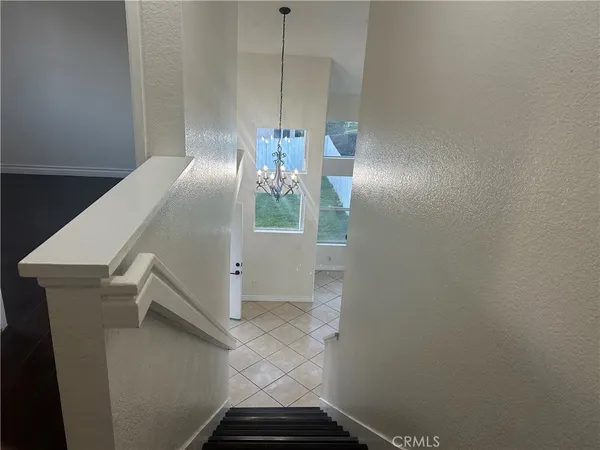 view of hall way with mirror