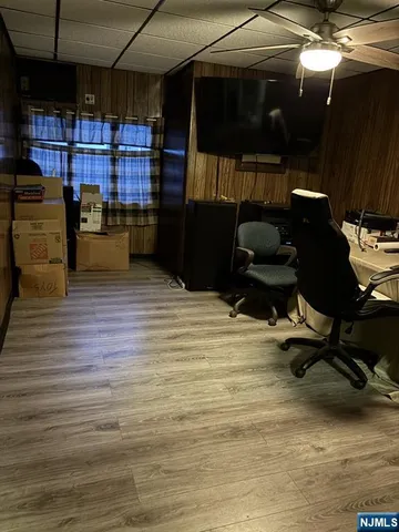 a room with lots of wooden furniture