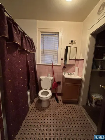 a bathroom with a sink and a toilet