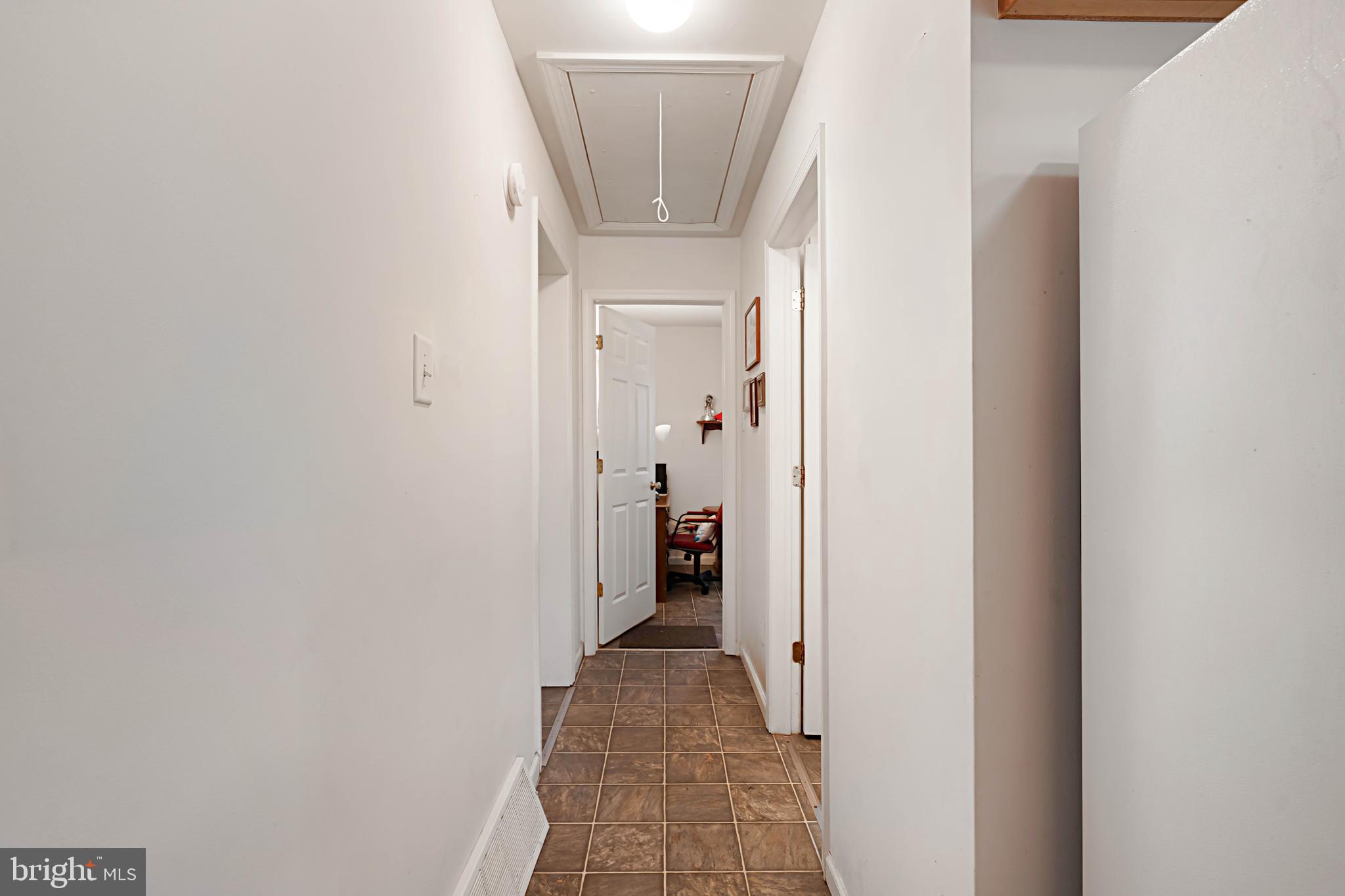 315 Beech Road Millville, NJ 08332 - Photo 11 of 21 a view of a hallway with wooden shelves