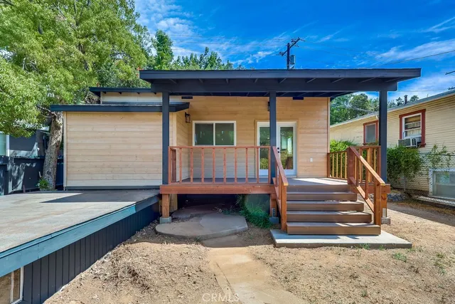 a front view of a house with a porch