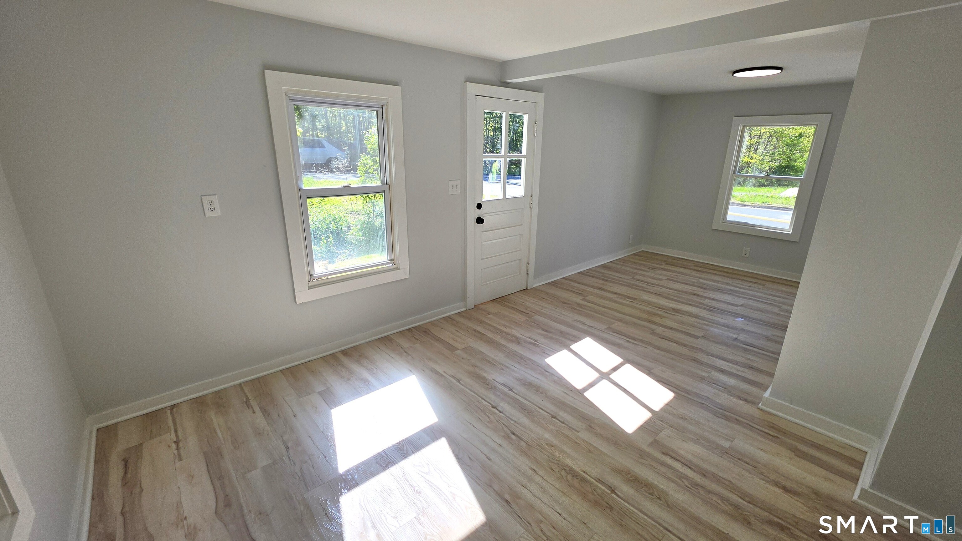2 Maria Hotchkiss Road Prospect, CT 06712 - Photo 13 of 17 a view of empty room with wooden floor and fan